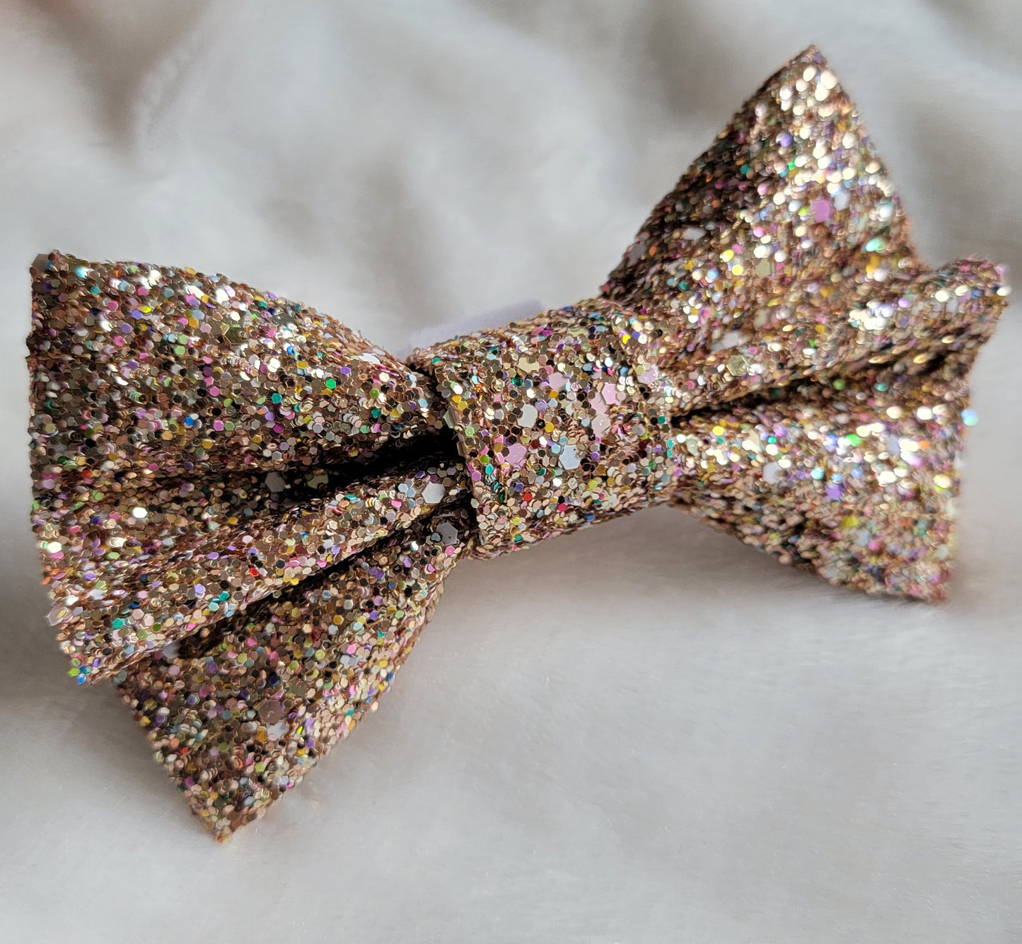 Light gold with multicolor confetti glitter canvas bow.