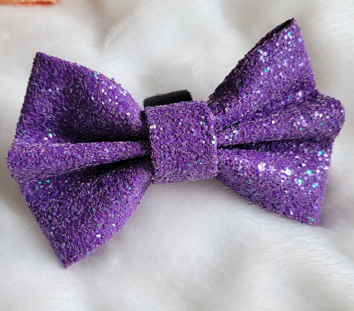 Dark iridescent purple glitter canvas bow.