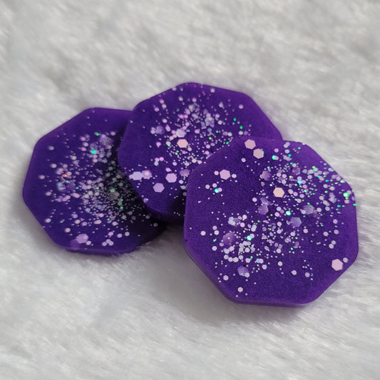 Octagon shaped epoxy resin pieces, bright violet with opal white glitter.