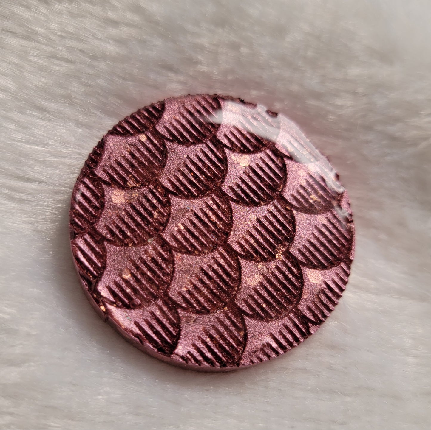 Round epoxy resin piece, metallic pink over rosy pink glitter fish scales design.