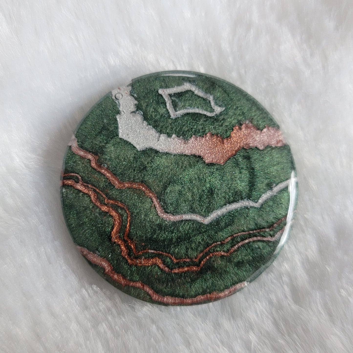 Green geode style epoxy resin piece.