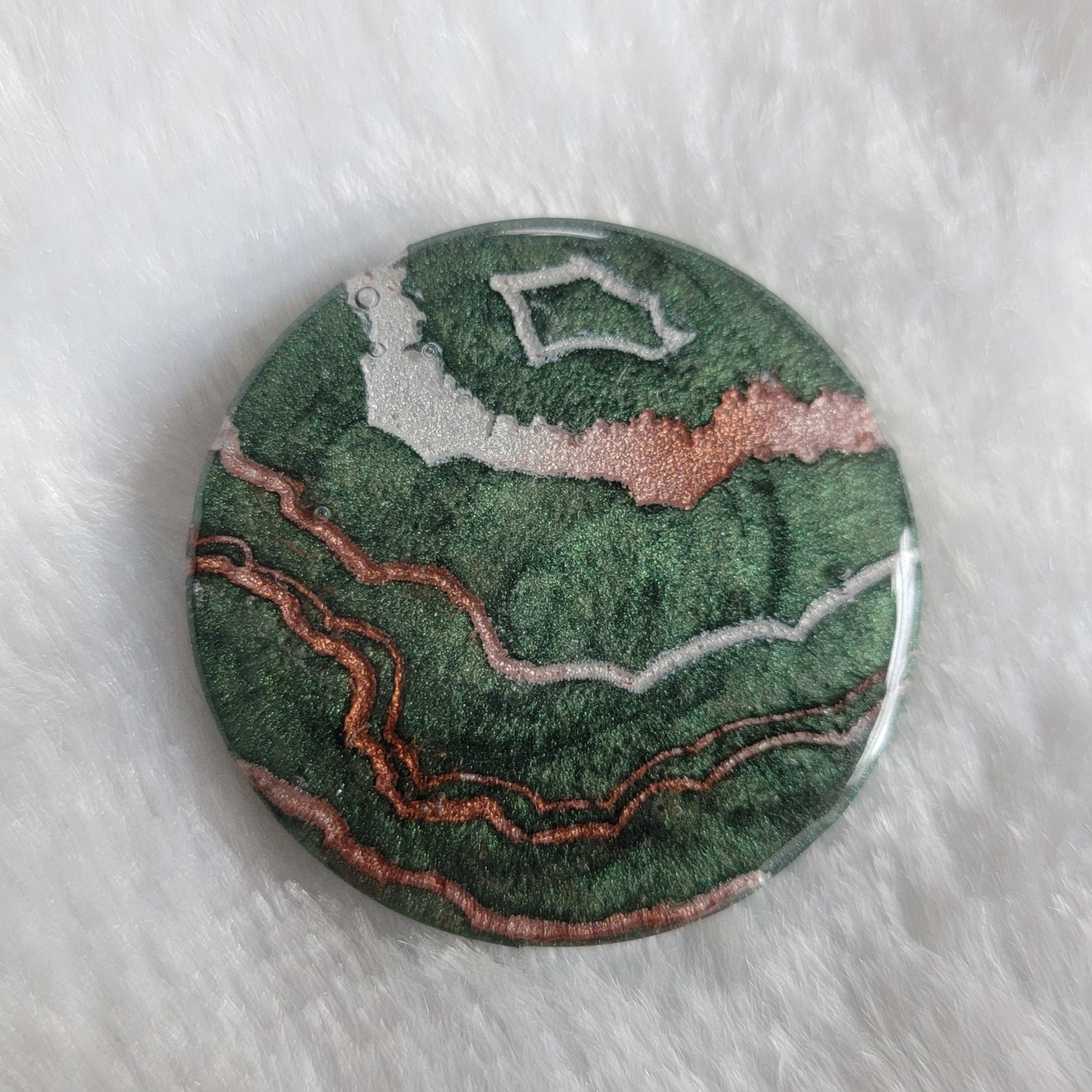 Green geode style epoxy resin piece.