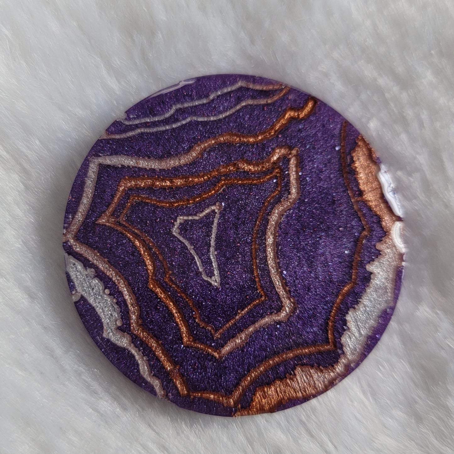 Purple geode style epoxy resin piece.