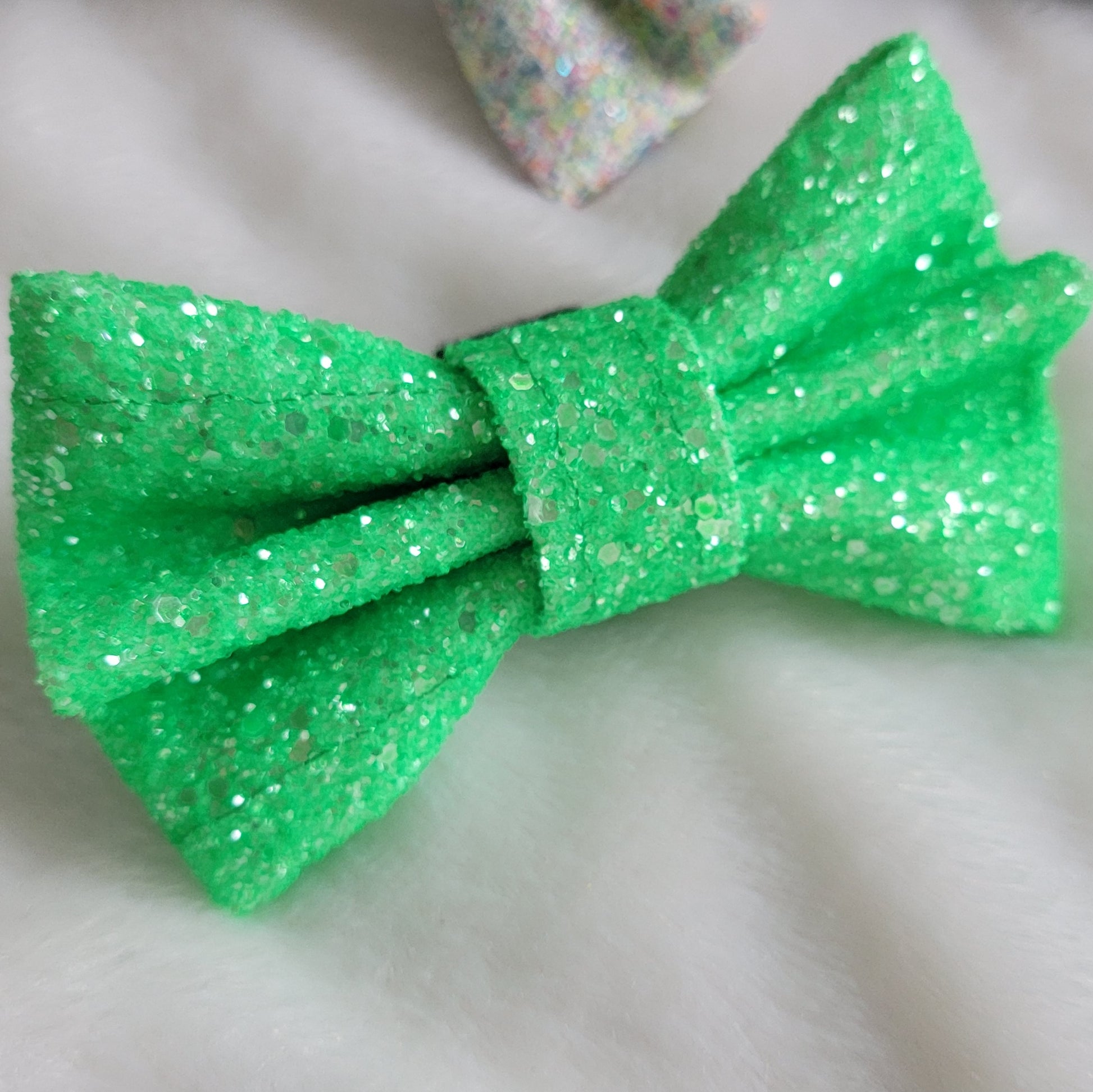 Bright lime green glitter canvas bow.