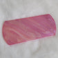 Pink swirled epoxy resin large rectangular piece with rounded ends for use as crate tag or decorative sign.