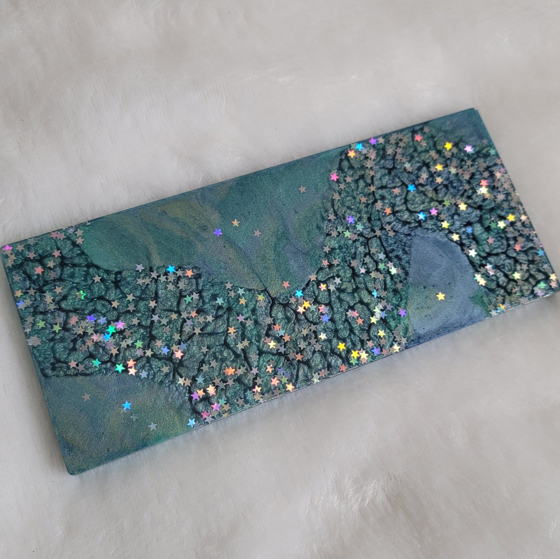 Subtle blue swirls with bold splash of holographic star shaped glitter, epoxy resin large rectangular piece with squared ends for use as crate tag or decorative sign.