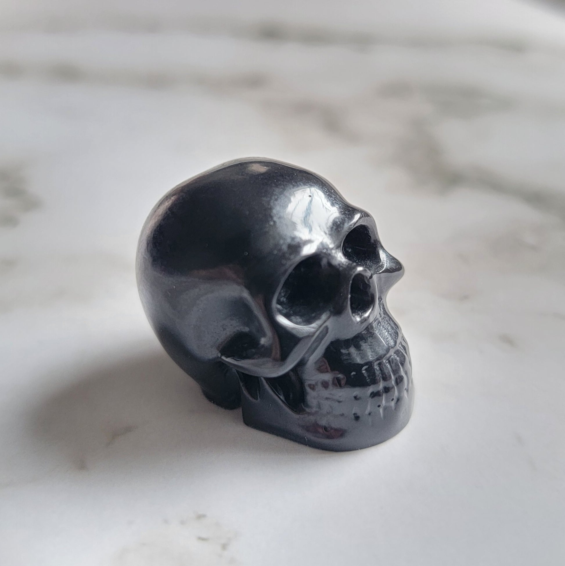 Small carbon black epoxy resin skull.