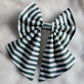 Green and white striped bow fabric sailor bow, displayed on a white background