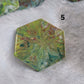 Hexagon shaped epoxy resin piece with swirling greens and rust colored pigments, displayed on a white background. The number "5" is in the top right corner.