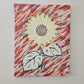 Sunflower art made with yellow, green and brown vinyl, with rust and navy blue acrylic abstract painted background on white; accented with gold glitter and sealed in epoxy resin.