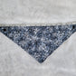 Bandana shown with measuring tape to show small size is 17", print is greyscale tree branches and bats.
