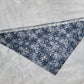 Bandana shown with measuring tape to show large size is 25.5", print is greyscale tree branches and bats.